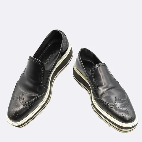 프라다 고이비토 중고명품 Prada(프라다) 윙팁 블랙 레더 여성용 클리퍼 - 250MM