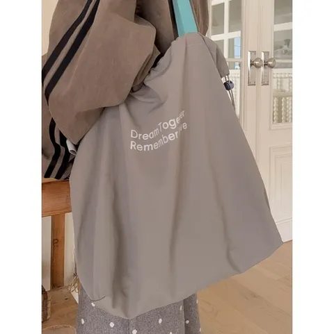 패션플러스 [엘루이즈] [엘루이즈] 클란츠 레터링 스트링 나일론 에코백(4color)