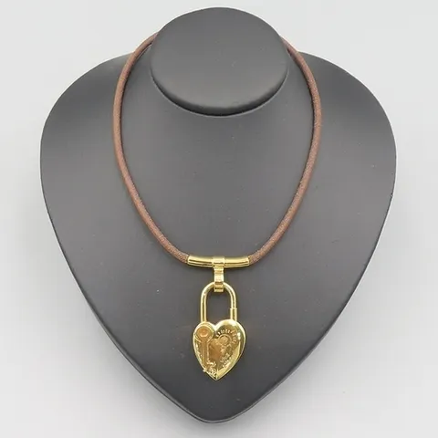 에르메스 고이비토 중고명품 Hermes(에르메스) ANNEE DE LA FANTAISIE 골드메탈 패드락 펜던트 가죽 목걸이