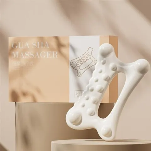 얼굴 괄사 마사지기