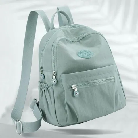 원형패치 경량 여성 백팩