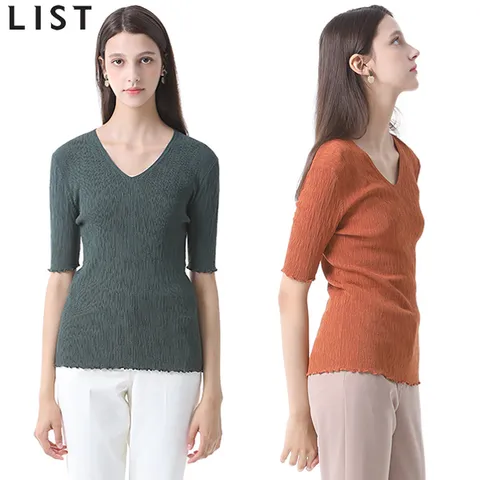 [리스트] 리브드 솔리드 브이넥 니트
