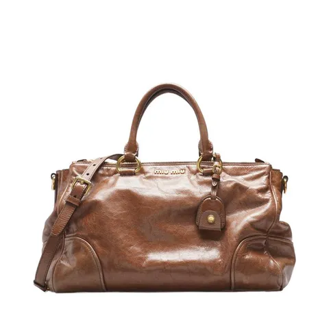 [중고명품] 미우 미우 브라운 레더 로고 비텔로 샤인 여성 토트백 RN1091